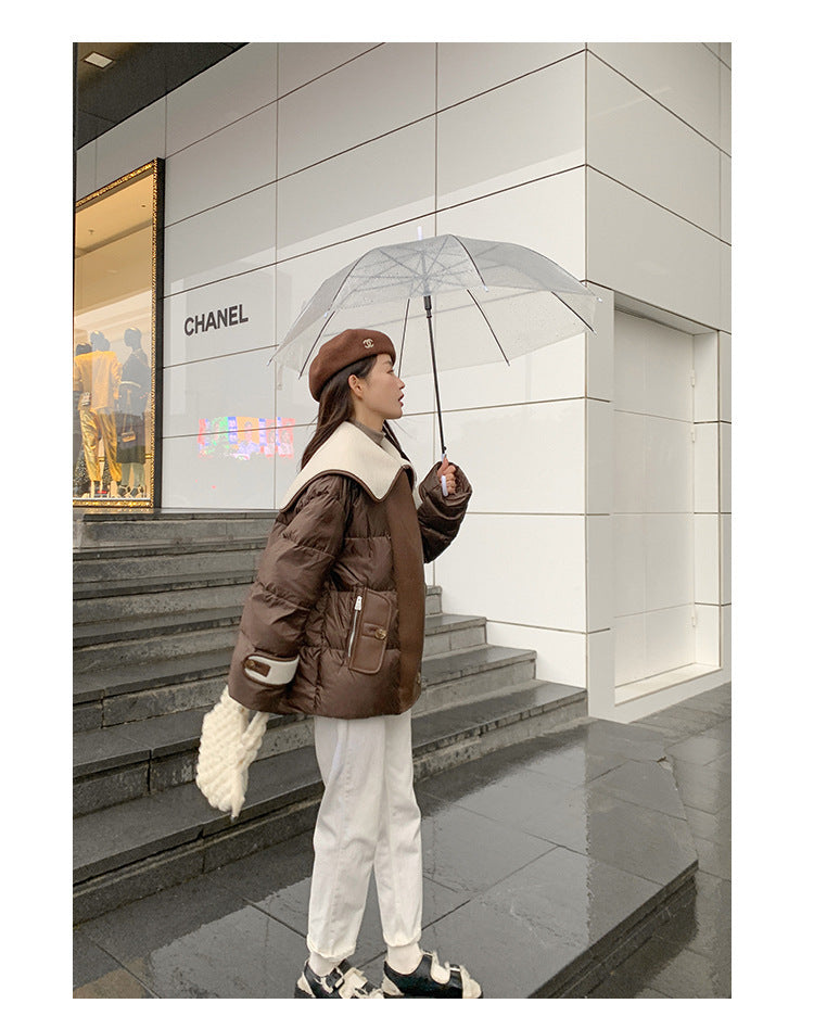 Doudoune à gros revers et coutures intégrées en fourrure