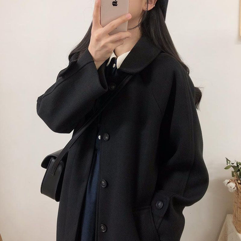 Manteau ample et épais au-dessus du genou pour femme